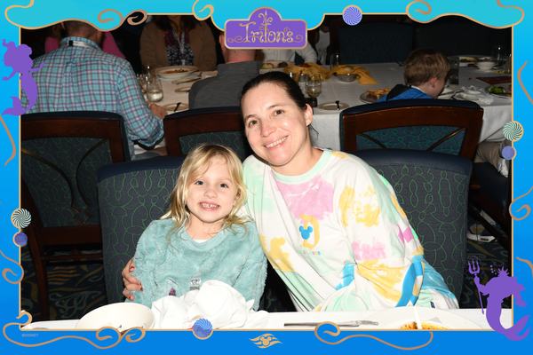 Mia and Kati at dinner on the Disney Wonder