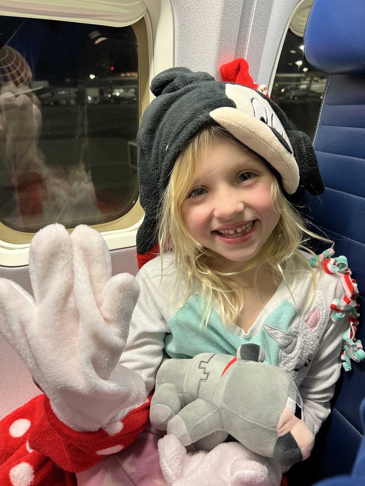 Mia on the plane to Disney World