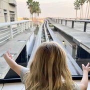 thumbnail for Mia on the airport tram to the airplane at Orlando International