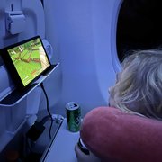 thumbnail for Mia on the airplane playing Nintendo heading home from Florida