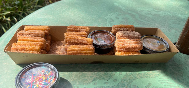 Family Churros with caramel chocolate and sprinkles