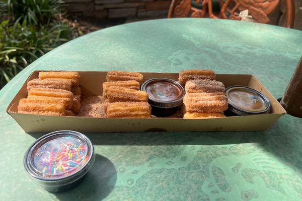 Family Churros with caramel chocolate and sprinkles
