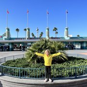 thumbnail for Mia at the front of Hollywood Studios waiting for the Darabans'