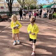 thumbnail for Mia and Bennett walking into EPCOT with matching hoodies