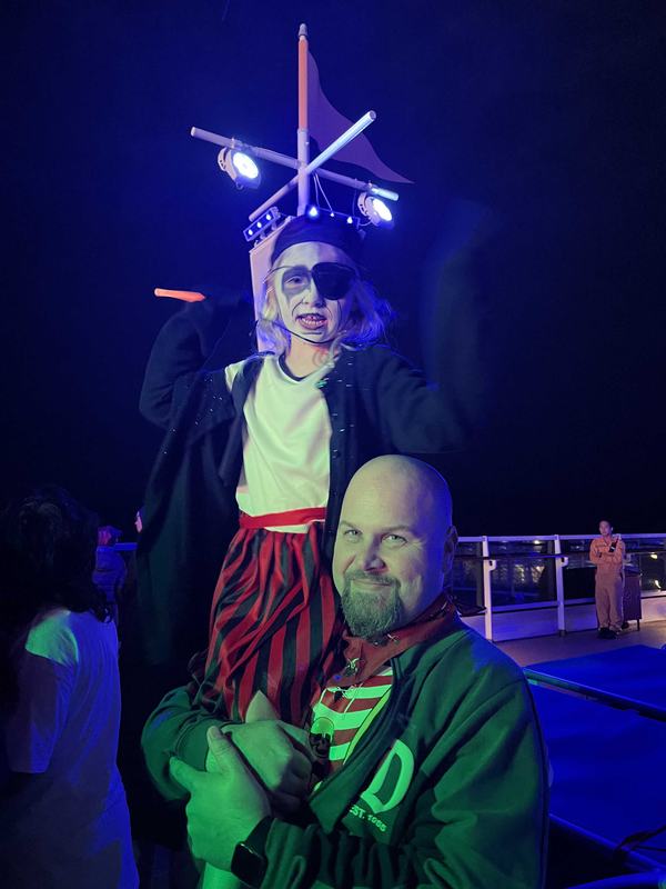 James and Mia on deck 10 of the Disney Wonder during Pirate Night