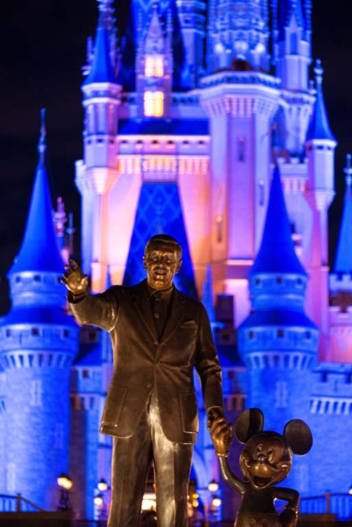 Walt and Mickey in front of Cinderella's Castle