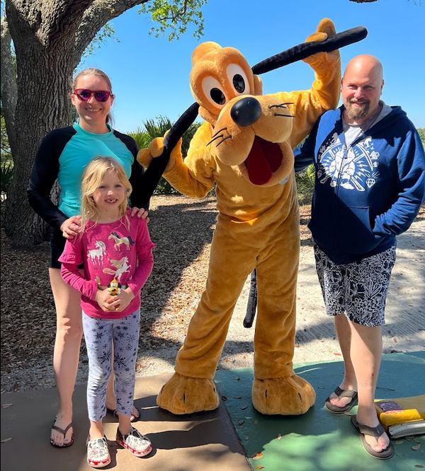 Kati, Mia, and Jimmy with Pluto at Disney's Hilton Head Resort