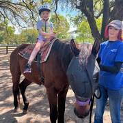 thumbnail for Mia on a pony ride at Lawton Stables