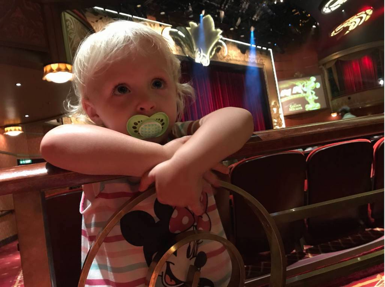 Mia in the Walt Disney Theater on the Disney Cruise