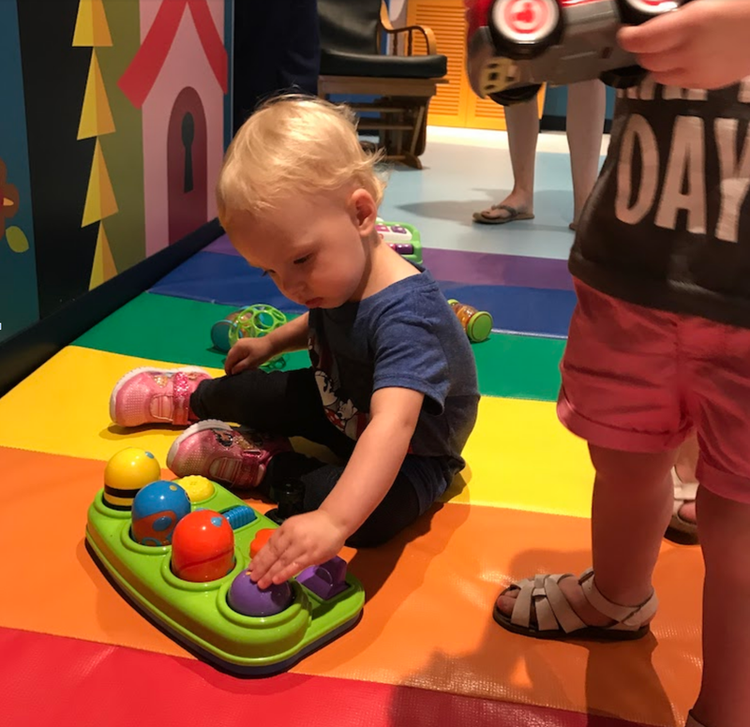 Mia at the "It&#x27;s a Small World" nursery on the Disney Cruise