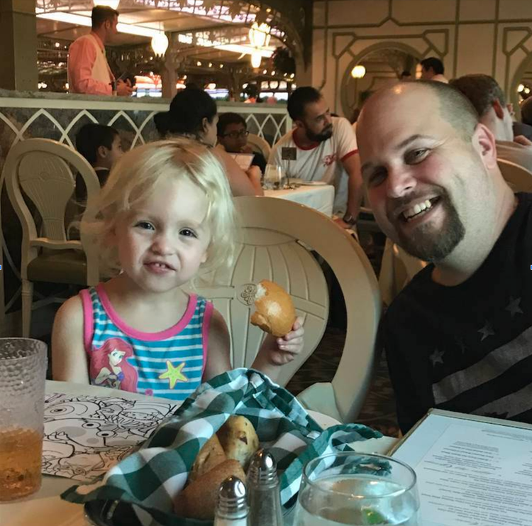 Mia and James eating dinner on the Disney Cruise