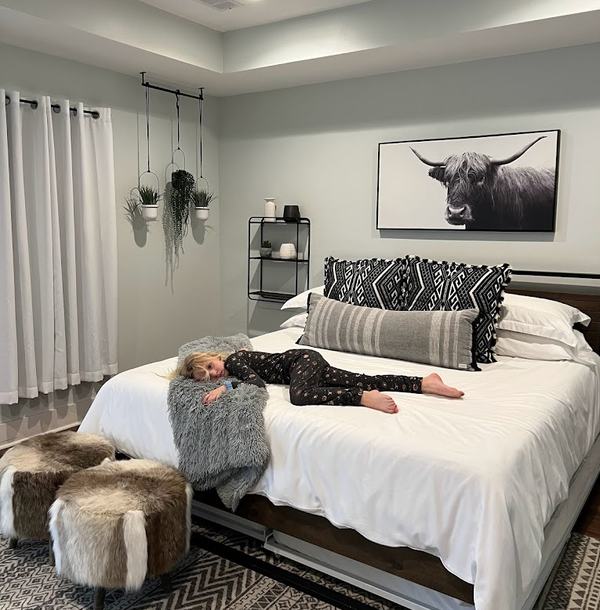 Mia in one of the 3 bedrooms at the AirBnB in Atlanta