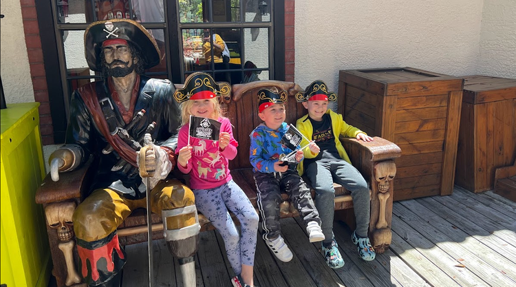 Mia, Tavasz, and Bennett at Pirate&#x27;s Island Adventure Golf in Hilton Head