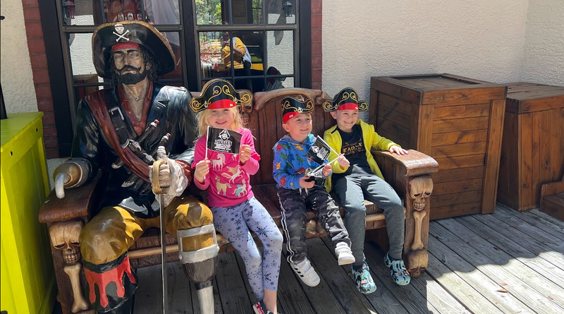 Mia, Tavasz, and Bennett at Pirate's Island Adventure Golf in Hilton Head