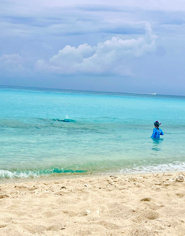 Mia snorkeling in Bimini from the beach