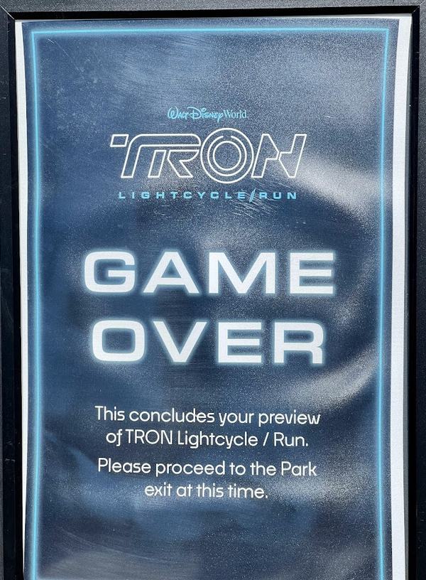 Tron annual passholder exit sign
